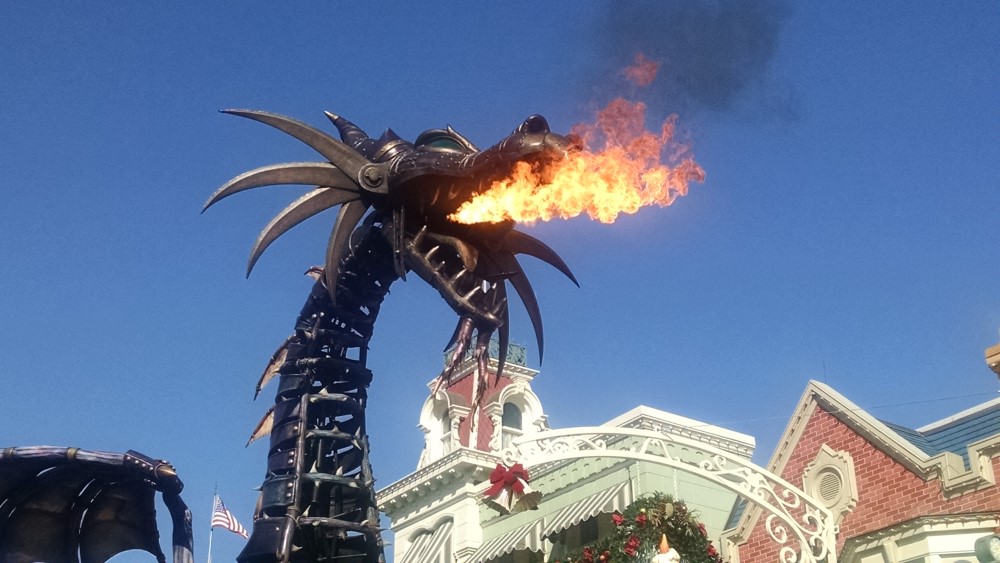Maleficent breathing fire in the festival of fantasy parade