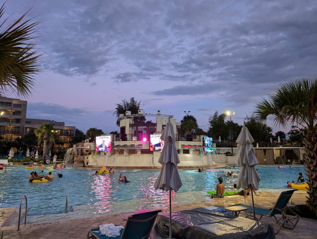 Main pool with poolside movies in the evening